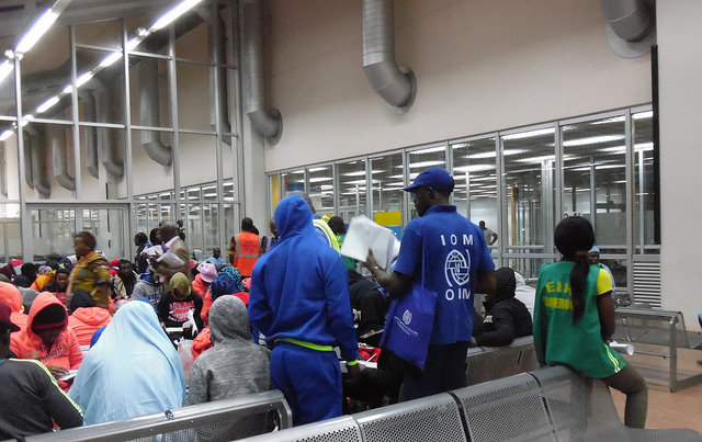 Workers with IOM register returned migrants at Yaounde Nsimalen Airport in Cameroon. Credit: Mbom Sixtus/IPS